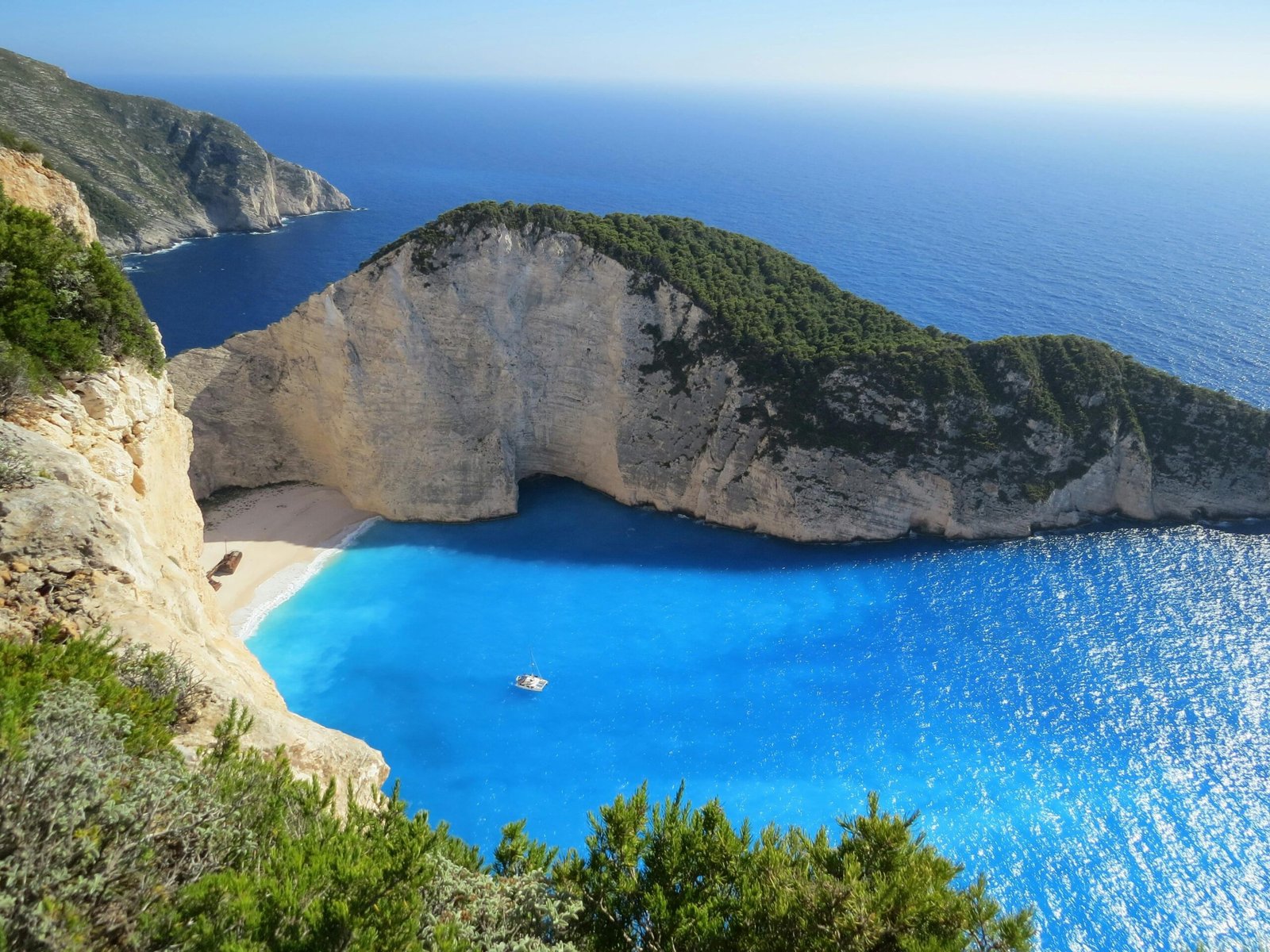 Blue Sea Under Clear Blue Sky